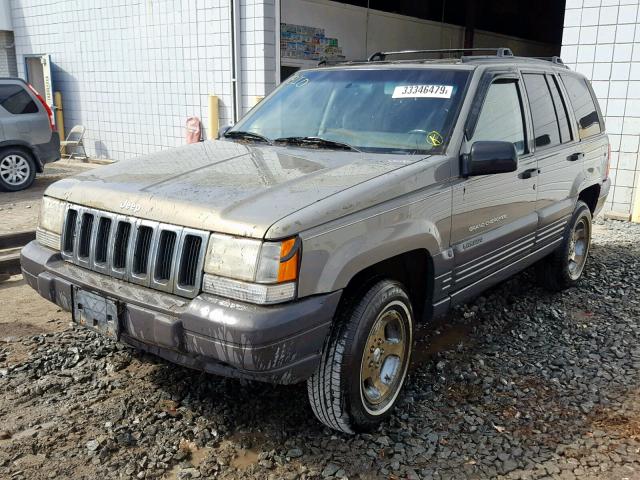 1J4GZ58S3VC684680 - 1997 JEEP GRAND CHER SILVER photo 2