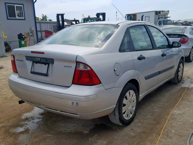 1FAFP34N36W108489 - 2006 FORD FOCUS ZX4 GRAY photo 4