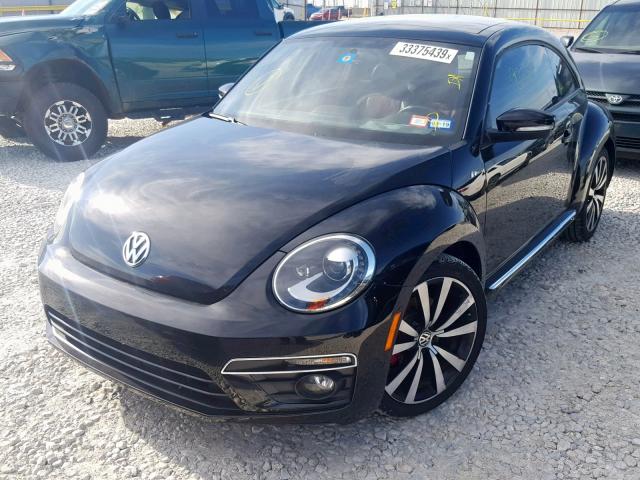 3VWVS7AT1EM635103 - 2014 VOLKSWAGEN BEETLE TUR BLACK photo 2