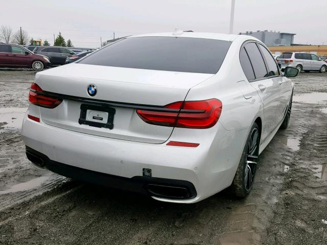 WBA7B0C56HG527055 - 2017 BMW 750 XI WHITE photo 4