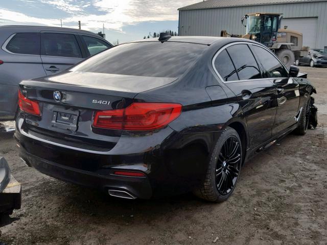 WBAJE7C51JWC55759 - 2018 BMW 540 XI BLACK photo 4