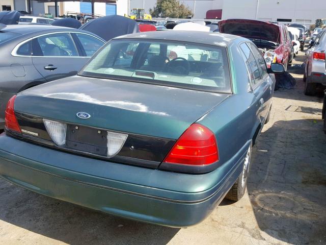 2FAFP71W8YX207904 - 2000 FORD CROWN VICT GREEN photo 4