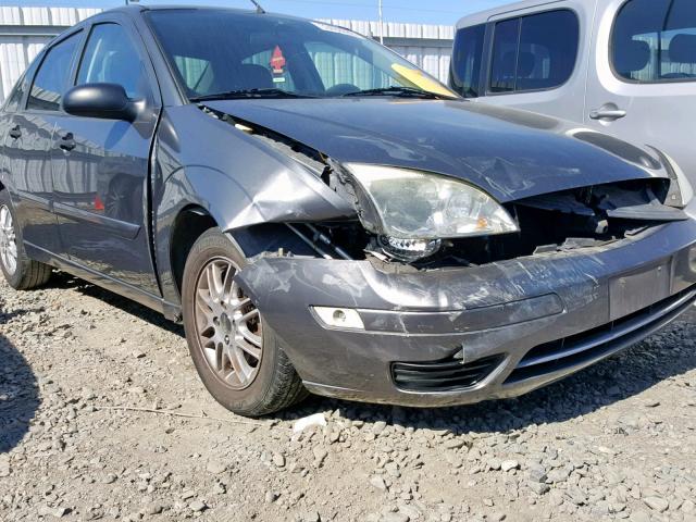 1FAFP34N06W135732 - 2006 FORD FOCUS ZX4 GRAY photo 9