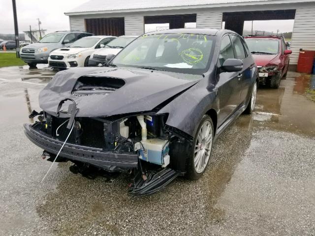 JF1GR89668L833098 - 2008 SUBARU IMPREZA WR GRAY photo 2