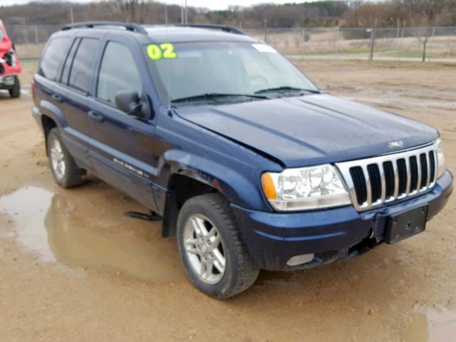 1J4GW48S62C328660 - 2002 JEEP GRAND CHER BLACK photo 1