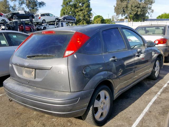 3FAFP37Z43R147279 - 2003 FORD FOCUS ZX5 GRAY photo 4