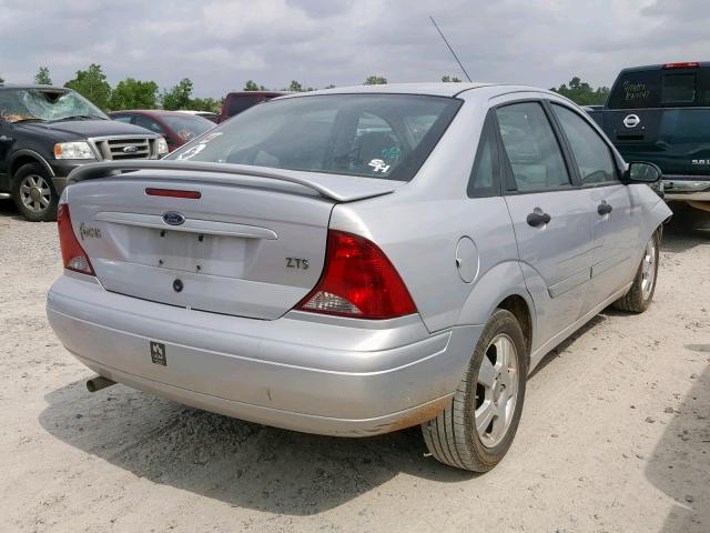 1FAFP38Z54W115261 - 2004 FORD FOCUS ZTS SILVER photo 4