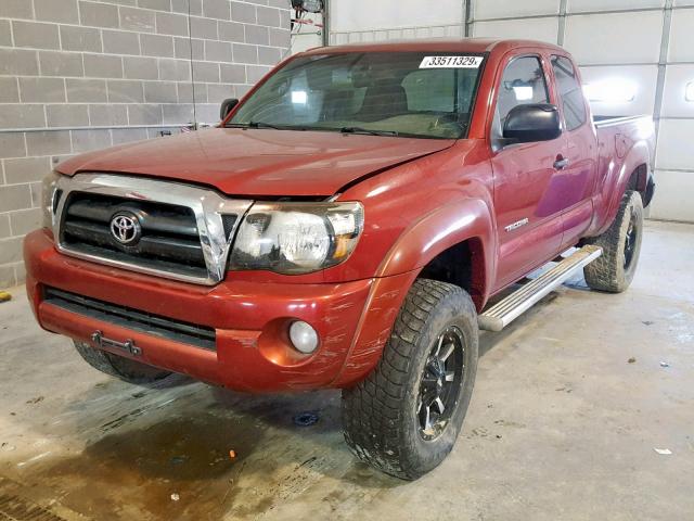 5TETU62N06Z275454 - 2006 TOYOTA TACOMA PRE RED photo 2