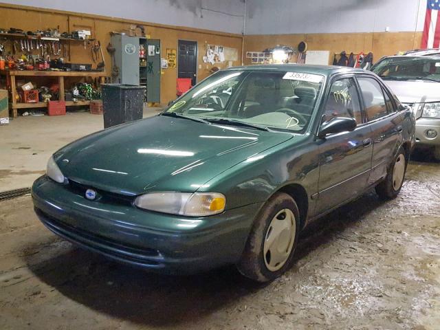 1Y1SK54832Z411175 - 2002 CHEVROLET GEO PRIZM GREEN photo 2