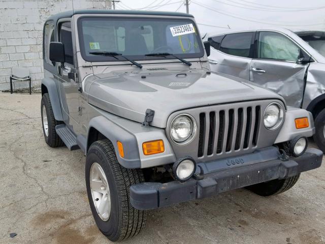 1J4FA49SX1P306175 - 2001 JEEP WRANGLER / GRAY photo 1