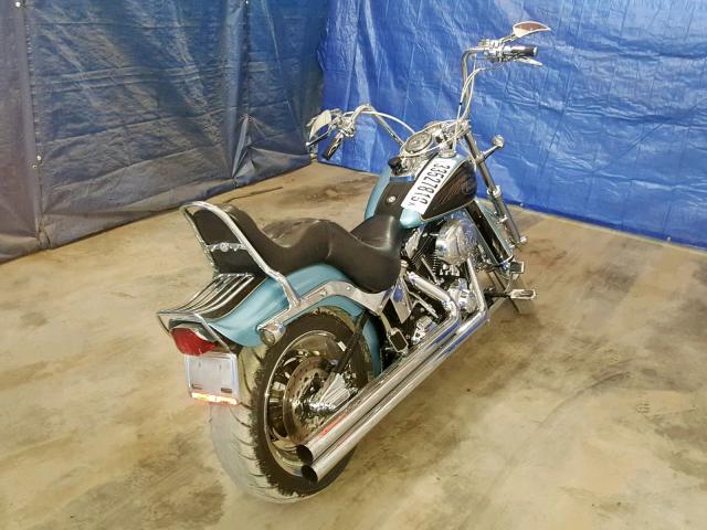 1HD1JL5127Y026338 - 2007 HARLEY-DAVIDSON FXST CUSTO BLUE photo 4