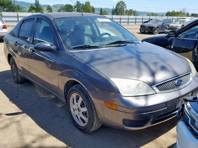 1FAFP34N35W258228 - 2005 FORD FOCUS ZX4 GRAY photo 1