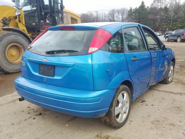 1FAHP37N97W218064 - 2007 FORD FOCUS ZX5 BLUE photo 4