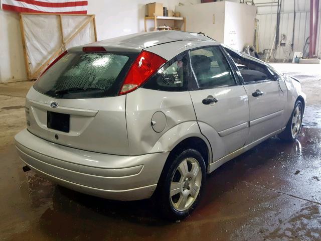 1FAHP37N67W323712 - 2007 FORD FOCUS ZX5 SILVER photo 4