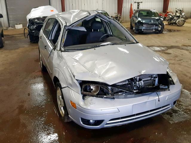 1FAHP37N67W323712 - 2007 FORD FOCUS ZX5 SILVER photo 9