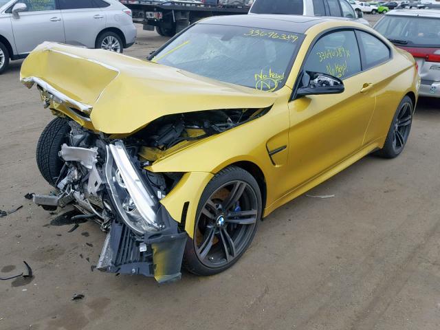 WBS3R9C59FK332975 - 2015 BMW M4 YELLOW photo 2