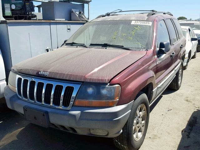 1J4GW58S0XC646934 - 1999 JEEP GRAND CHER RED photo 2