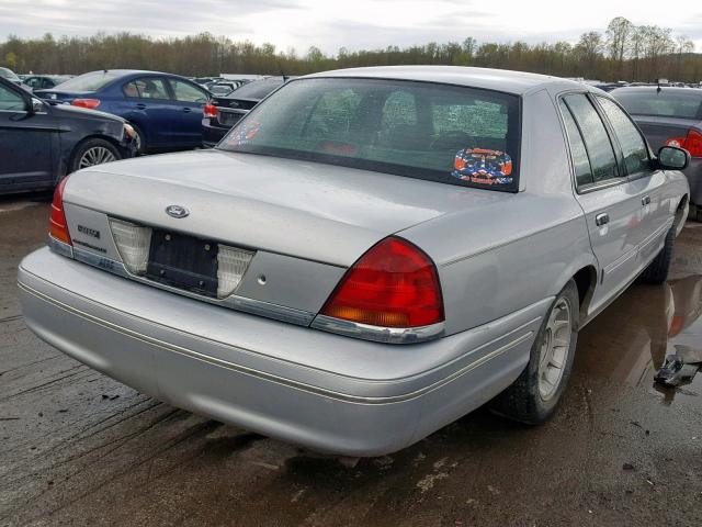 2FAFP74W62X102751 - 2002 FORD CROWN VICT SILVER photo 4