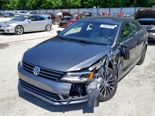 3VWD17AJXGM242121 - 2016 VOLKSWAGEN JETTA SPOR CHARCOAL photo 2