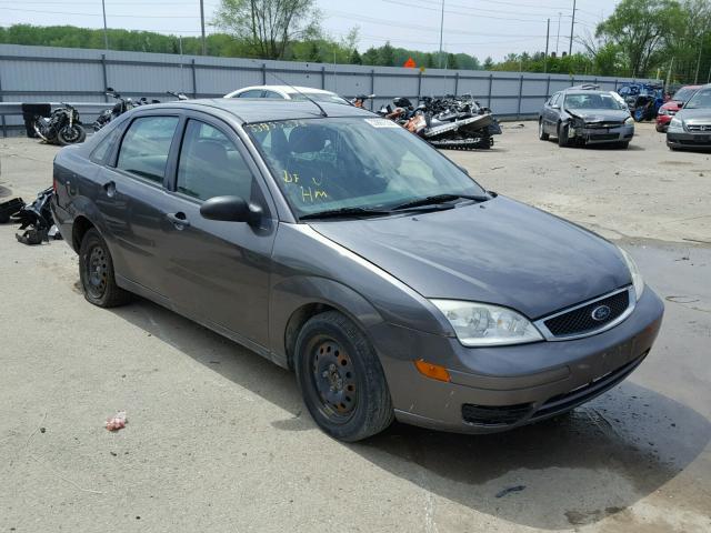 1FAFP34N97W130899 - 2007 FORD FOCUS ZX4 GRAY photo 1