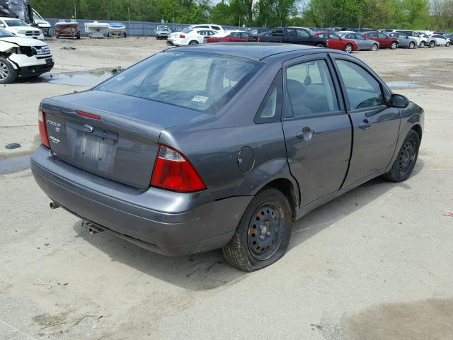 1FAFP34N97W130899 - 2007 FORD FOCUS ZX4 GRAY photo 4