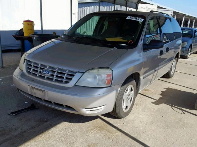 2FMZA51674BB01797 - 2004 FORD FREESTAR S SILVER photo 2