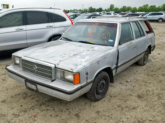 1P3BP49C5EF214785 - 1984 PLYMOUTH RELIANT CU GRAY photo 2