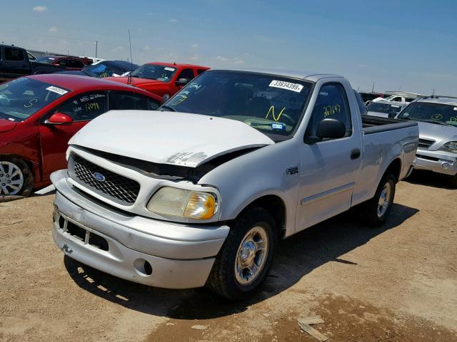 2FTRF17224CA07890 - 2004 FORD F-150 HERI SILVER photo 2