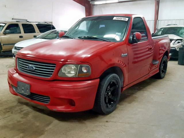 2FTZF0730YCA56580 - 2000 FORD F150 SVT L RED photo 2