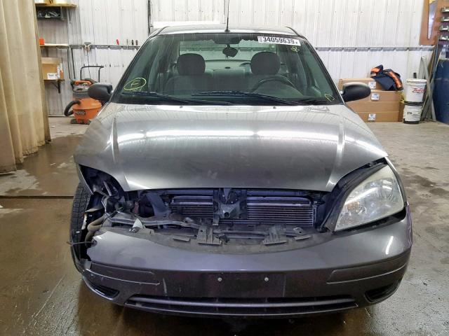 1FAFP34N25W109406 - 2005 FORD FOCUS ZX4 GRAY photo 10