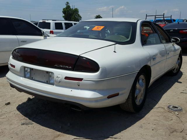 1G3GR62C7X4113204 - 1999 OLDSMOBILE AURORA WHITE photo 4