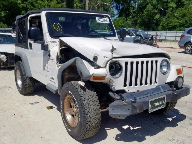 1J4FA49S14P767396 - 2004 JEEP WRANGLER / WHITE photo 1