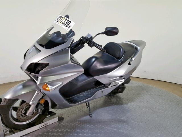 JH2MF06177K500498 - 2007 HONDA NSS250 SILVER photo 4