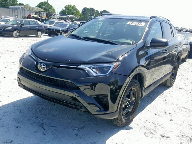 2T3ZFREV0JW521974 - 2018 TOYOTA RAV4 LE BLACK photo 2