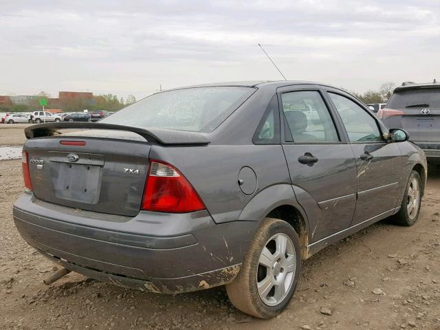 1FAFP34N55W103485 - 2005 FORD FOCUS ZX4 GRAY photo 4