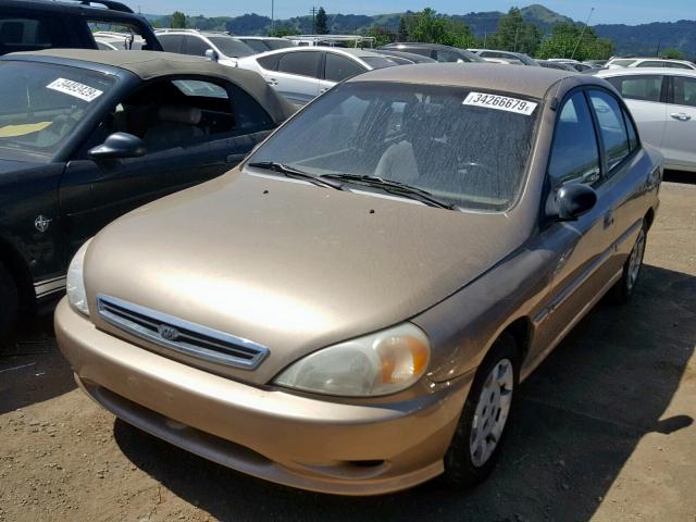 KNADC123726188745 - 2002 KIA RIO GOLD photo 2