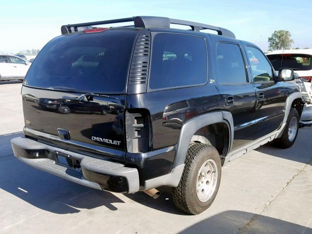 1GNEK13T64R175941 - 2004 CHEVROLET TAHOE K150 BLACK photo 4