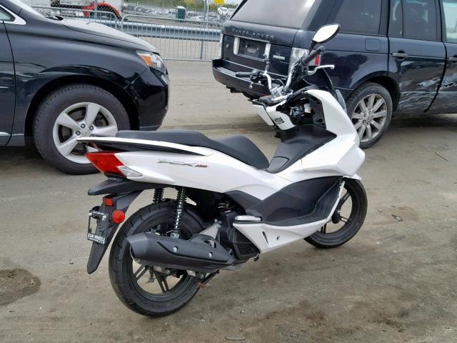 RLHKF1804FY000868 - 2015 HONDA PCX 150 WHITE photo 4