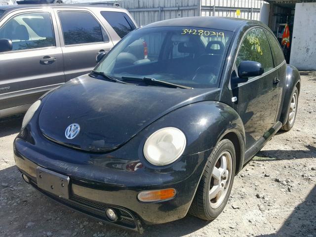 3VWCA21C4XM408987 - 1999 VOLKSWAGEN NEW BEETLE შავი ფოტო 2