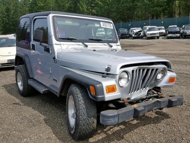 1J4FA49S22P744450 - 2002 JEEP WRANGLER / SILVER photo 1