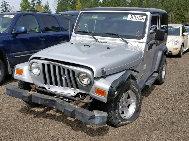 1J4FA49S22P744450 - 2002 JEEP WRANGLER / SILVER photo 2