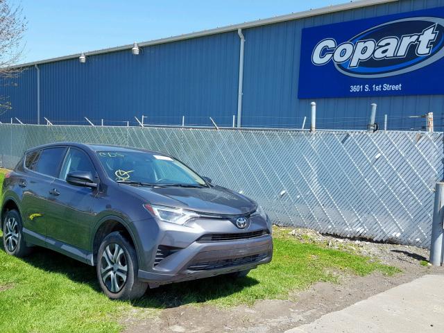 2T3BFREV0JW712120 - 2018 TOYOTA RAV4 LE GRAY photo 1