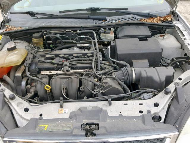 1FAFP34N45W184334 - 2005 FORD FOCUS ZX4 SILVER photo 7