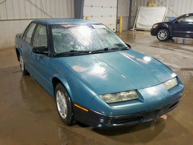 1G8ZG5284SZ329649 - 1995 SATURN SL1 TEAL photo 1