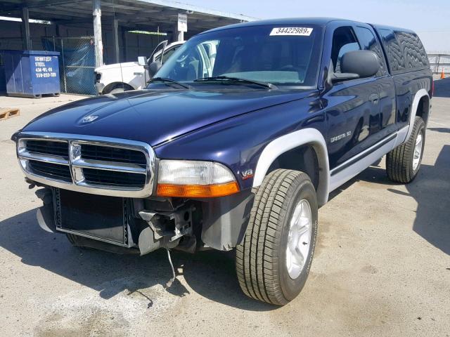 1B7GG22Y2XS133043 - 1999 DODGE DAKOTA PURPLE photo 2