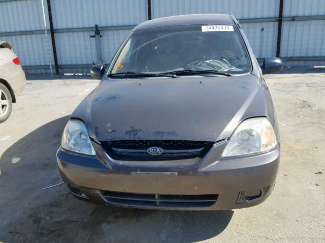 KNADC125836248308 - 2003 KIA RIO GRAY photo 9