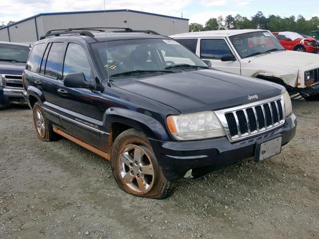 1J8GX68J64C163324 - 2004 JEEP GRAND CHER BLACK photo 1