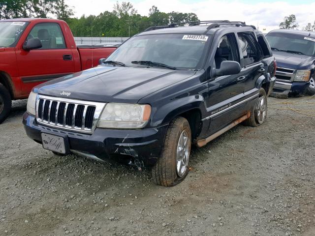 1J8GX68J64C163324 - 2004 JEEP GRAND CHER BLACK photo 2