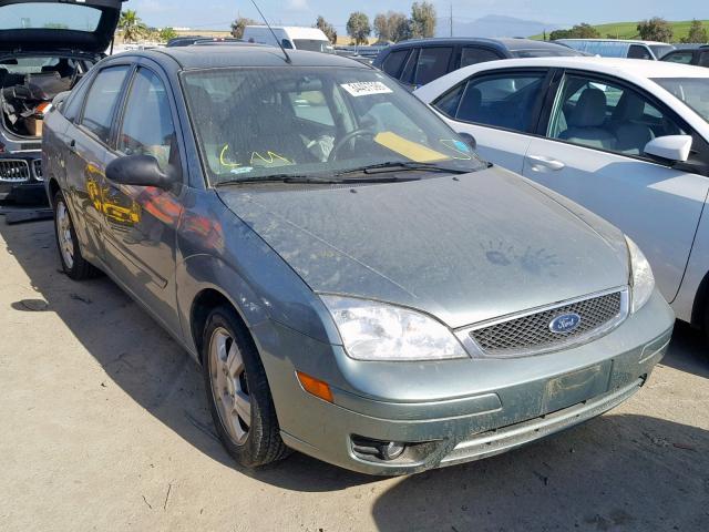 1FAHP34N35W187864 - 2005 FORD FOCUS ZX4 SILVER photo 1