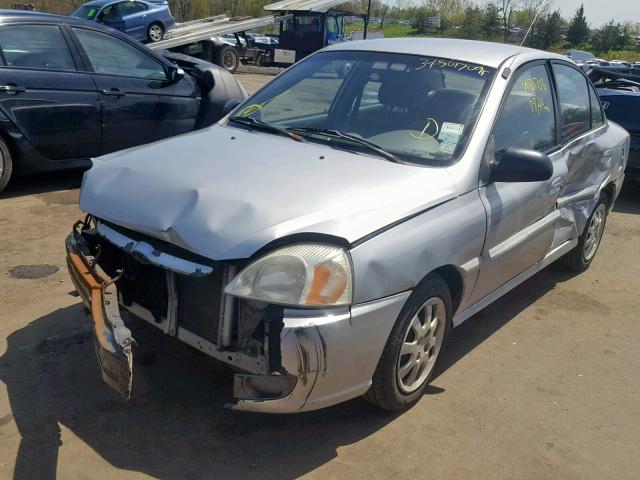 KNADC125736252964 - 2003 KIA RIO GRAY photo 2